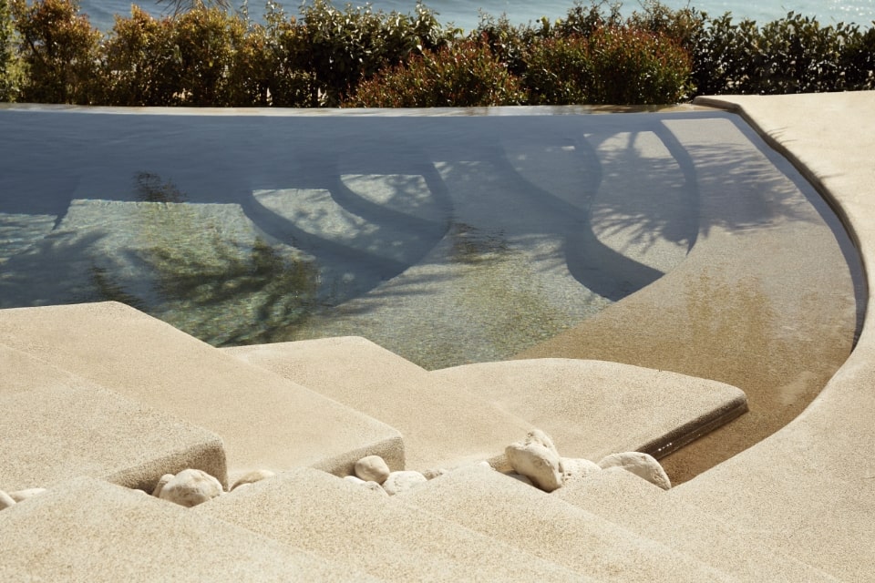 stoned stairs of a rooftop pool on a hotel in Athens