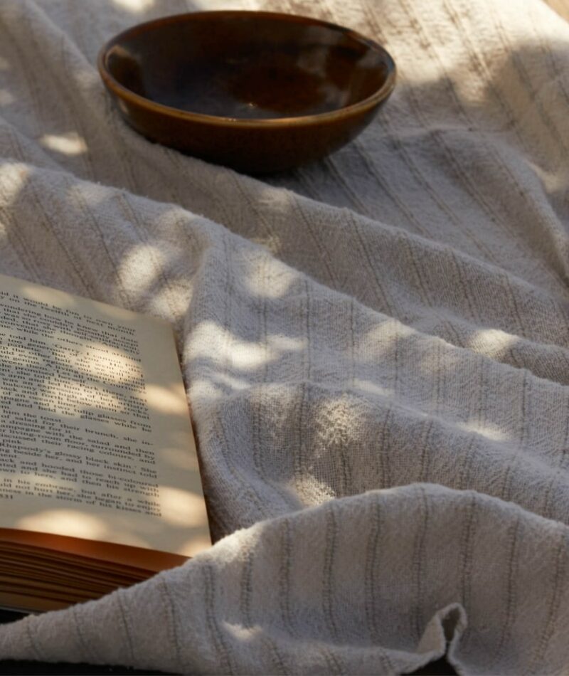 Book and Glass of Water at a Luxurious Wellness Retreat in Athens