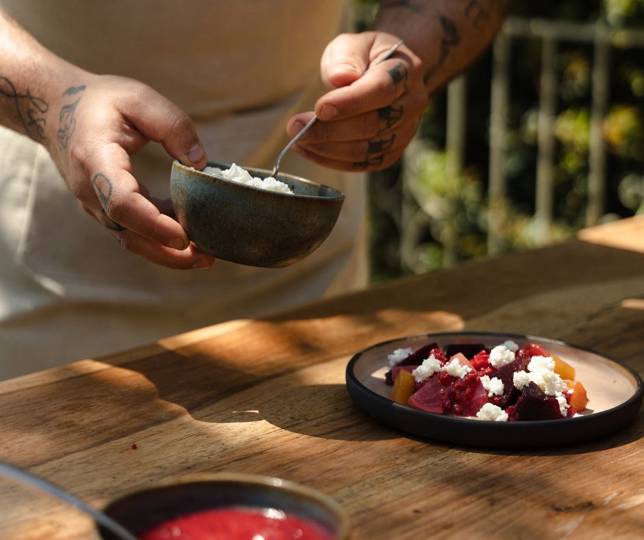 chef serving food on an authentic greek restaurant