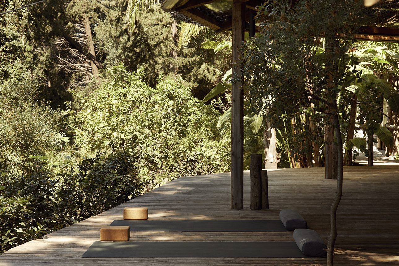 mattresses on wooden floor at a yoga retreat in Greece