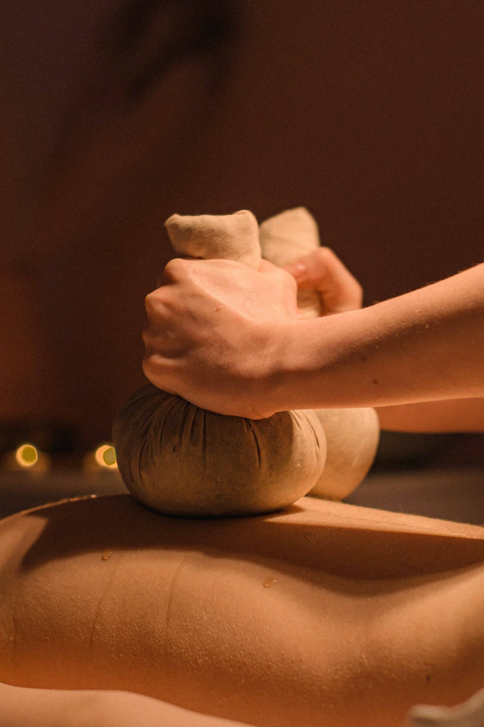 therapist doing a massage on a wellness spa hotel in Athens