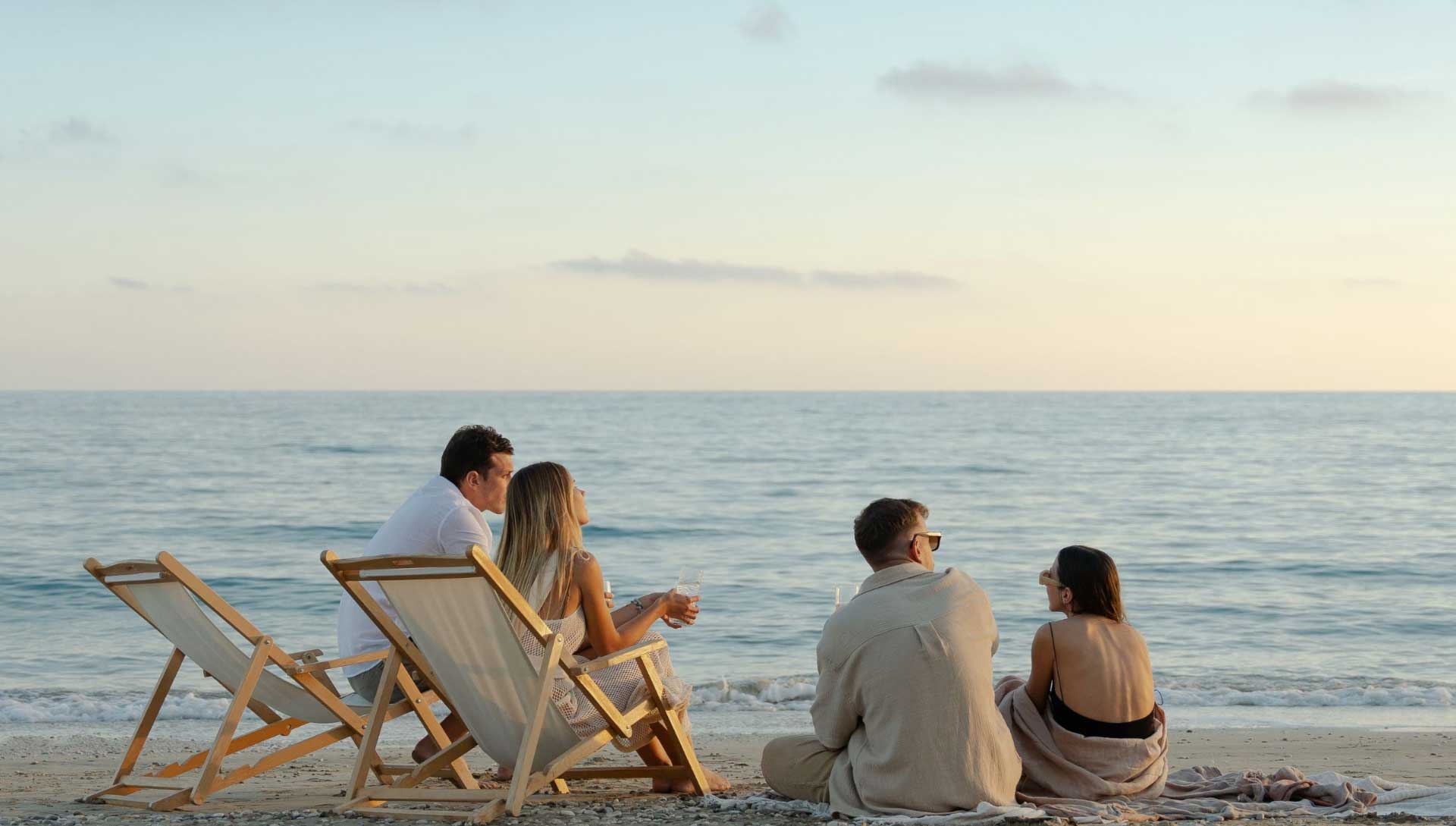 a group of friends having activities in Greece by the sea