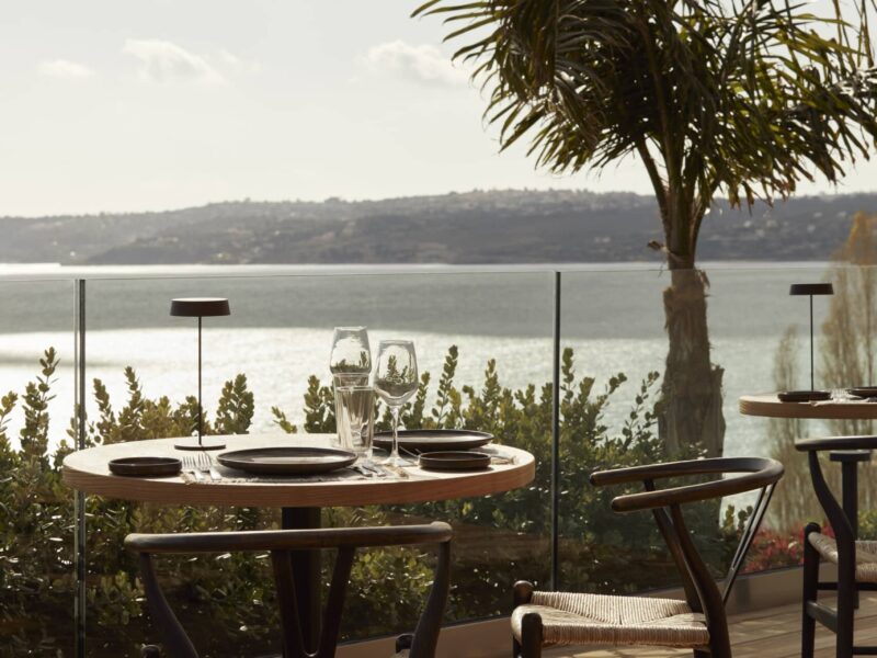 summer dining table in kefalonia with sea view