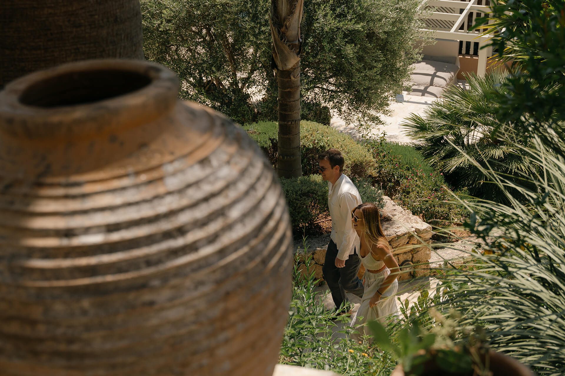 a couple walking stairs on a wellness retreat